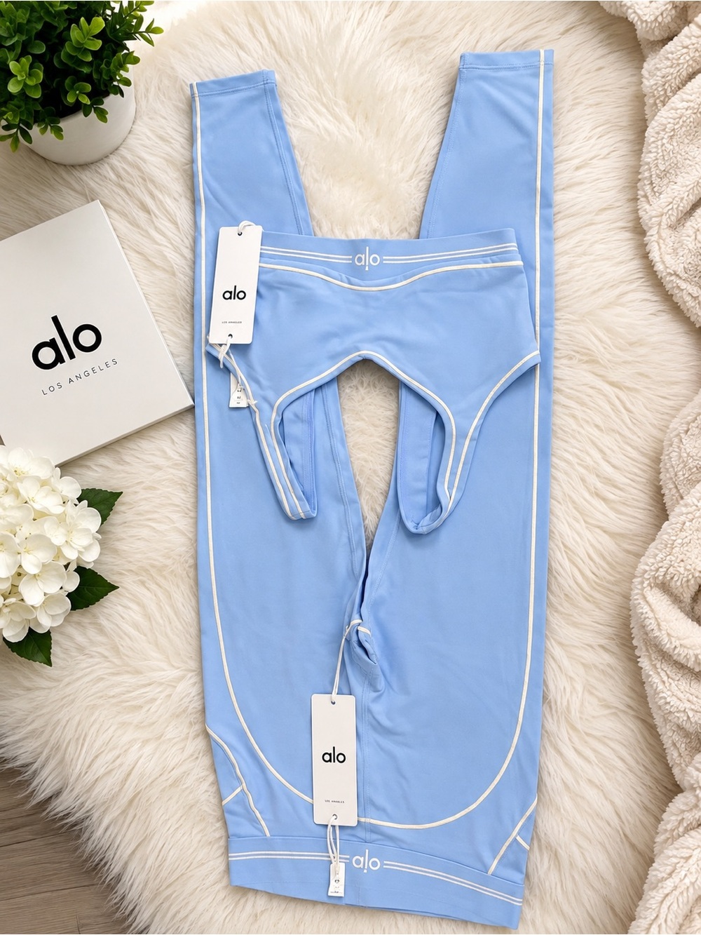 ALO Yoga Light Blue Sports Bra with White Seam Trim